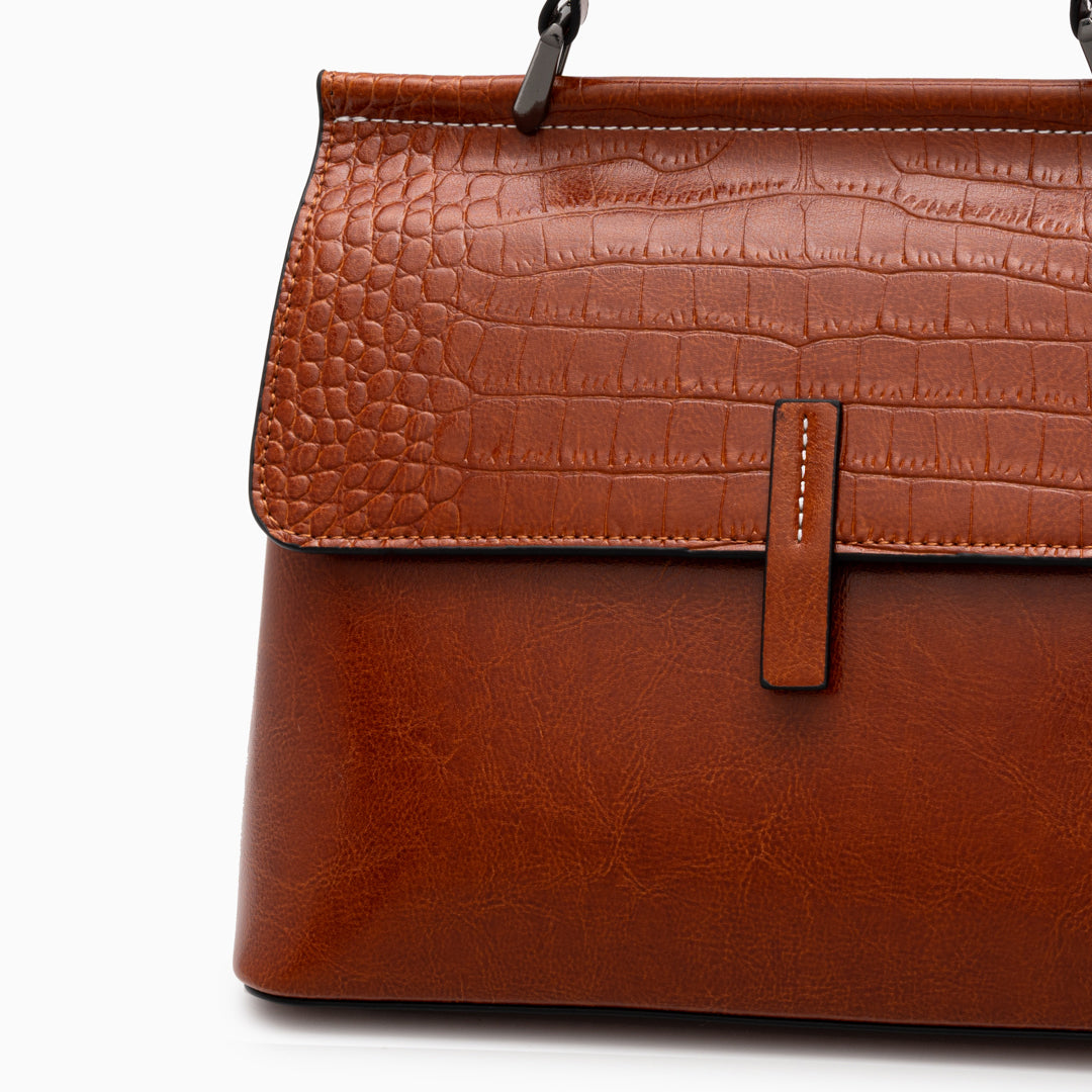 <tc>Borsa Kesha in coccodrillo</tc>