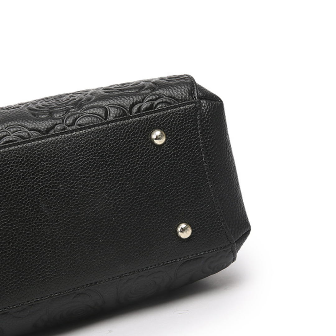 <tc>Borsa Stacy con stampa floreale in rilievo</tc>
