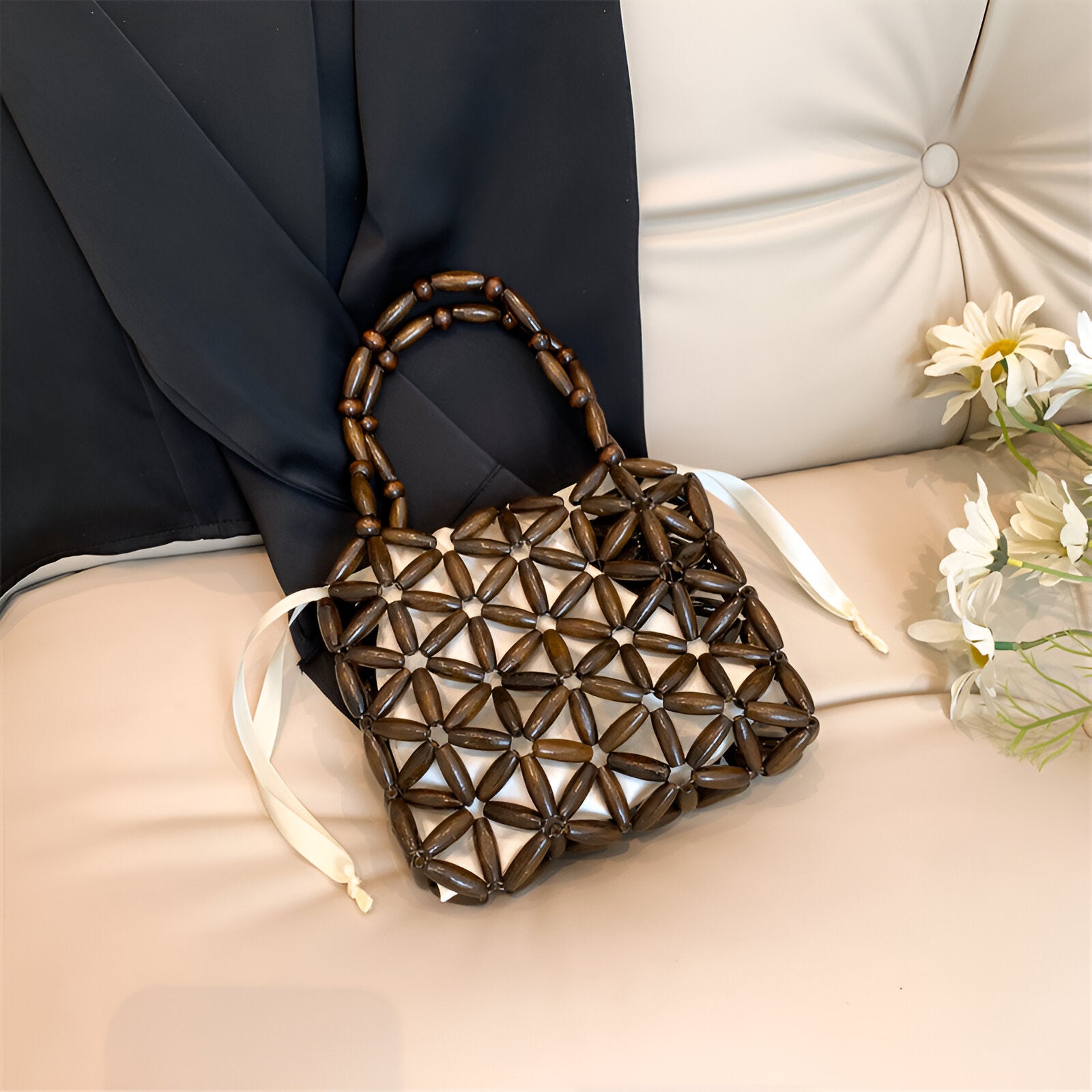 <tc>Borsa Campbell intrecciata</tc>