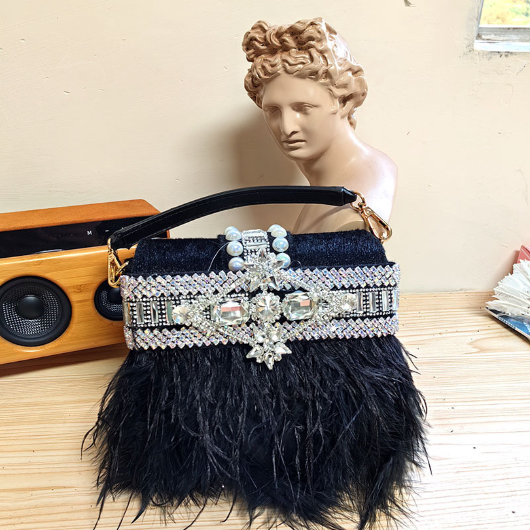 <tc>Borsa Velora in piuma</tc>