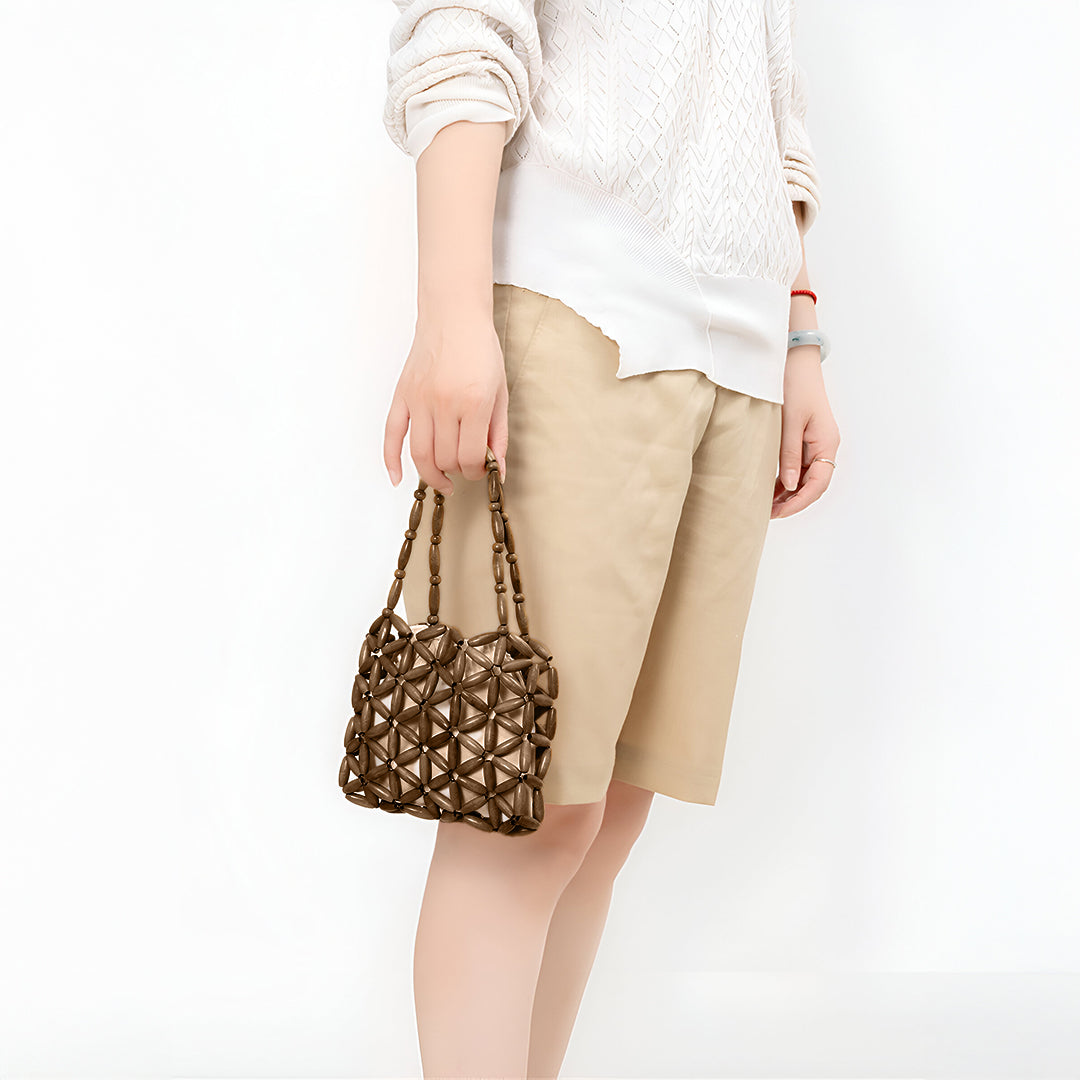 <tc>Borsa Campbell intrecciata</tc>