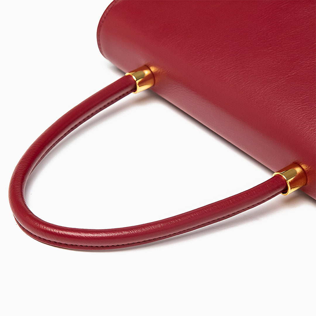 Regal Charm Suede Handbag